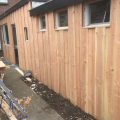 achter gevel bekleed